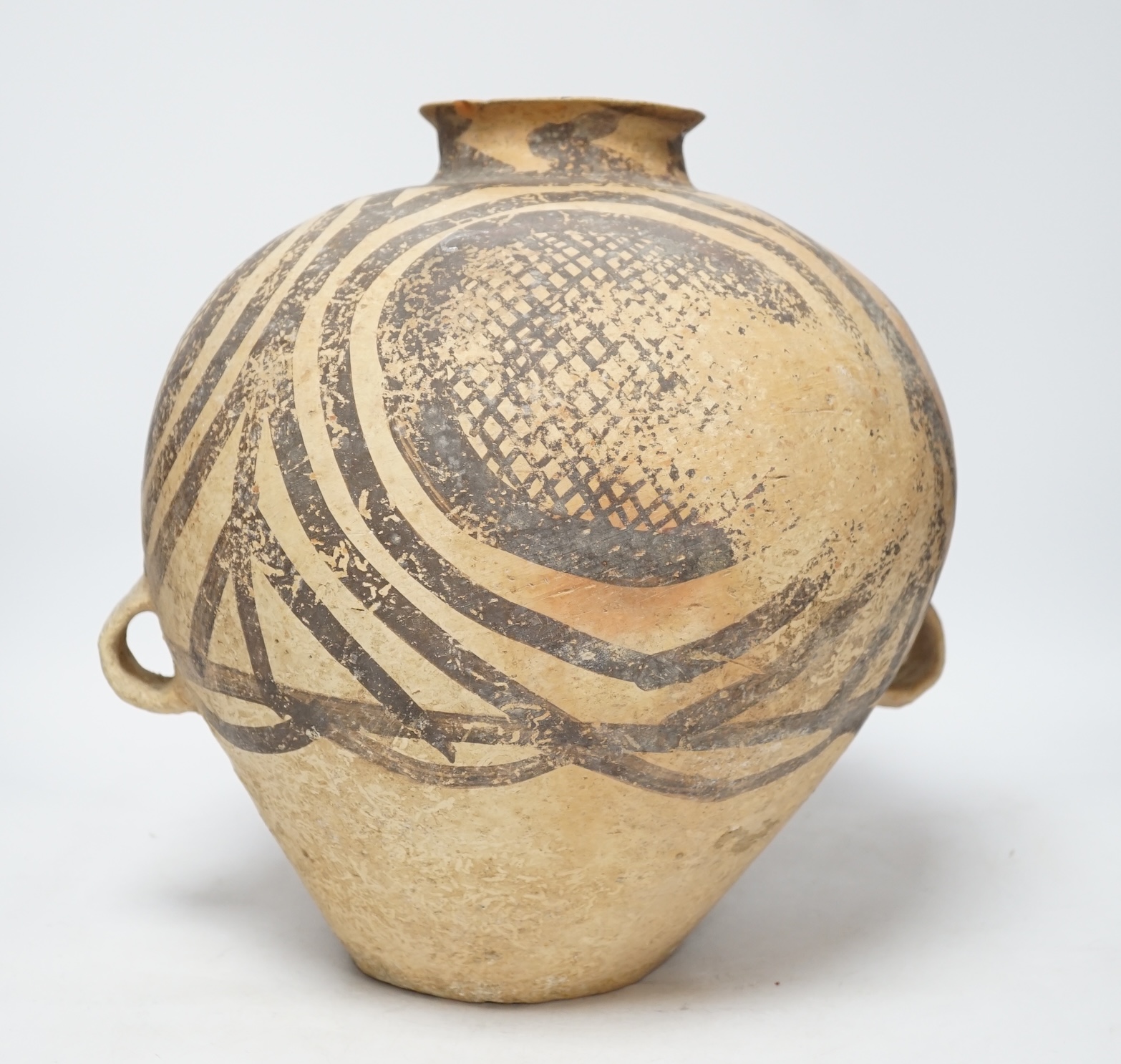 A large Chinese black painted pottery jar, Neolithic, Machang period, with Oxford Thermoluminescence certificate, 33cm